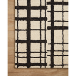 Featuring Polly Chris Loves Julia x Loloi Black / Ivory Rug by Loloi at Amethyst Home. Hand-tufted of wool and jute pile, the Polly Black / Ivory rug for Chris Loves Julia x Loloi brings a fresh take on modern yet classic designs. With striking gridded designs toned down by a neutral color palette, Polly is a timeless choice for any room. Polly is also GoodWeave certified, ensuring. Amethyst Home provides interior design, new construction, custom furniture, and rugs for the Winter Park metro area.