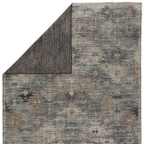 Featuring Rize Nakoda Hand-Knotted Rug by Jaipur Living at Amethyst Home. The Rize Nakoda Area Rug offers intricate and delicately designed global patterns to the modern home. A dynamic tribal motif creates an all-over design on the artistically distressed Nakoda area rug. In a black, tan, white, and blue colorway, this durable hand-knotted wool accent blend.  Amethyst Home provides interior design, new home construction design consulting, vintage area rugs, and lighting in the Houston metro area.