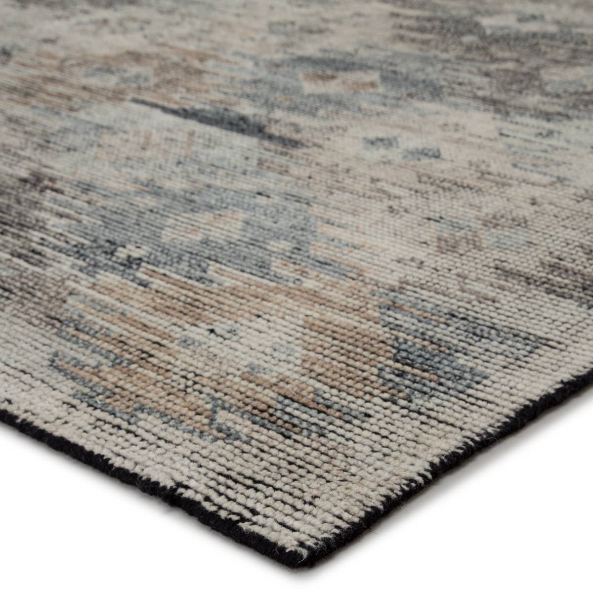 Featuring Rize Nakoda Hand-Knotted Rug by Jaipur Living at Amethyst Home. The Rize Nakoda Area Rug offers intricate and delicately designed global patterns to the modern home. A dynamic tribal motif creates an all-over design on the artistically distressed Nakoda area rug. In a black, tan, white, and blue colorway, this durable hand-knotted wool accent blends .  Amethyst Home provides interior design, new home construction design consulting, vintage area rugs, and lighting in the Tampa metro area.