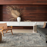 Featuring Rize Nakoda Hand-Knotted Rug by Jaipur Living at Amethyst Home. The Rize Nakoda Area Rug offers intricate and delicately designed global patterns to the modern home. A dynamic tribal motif creates an all-over design on the artistically distressed Nakoda area rug. In a black, tan, white, and blue colorway, this durable hand-knotted wool accent.  Amethyst Home provides interior design, new home construction design consulting, vintage area rugs, and lighting in the Newport Beach metro area.