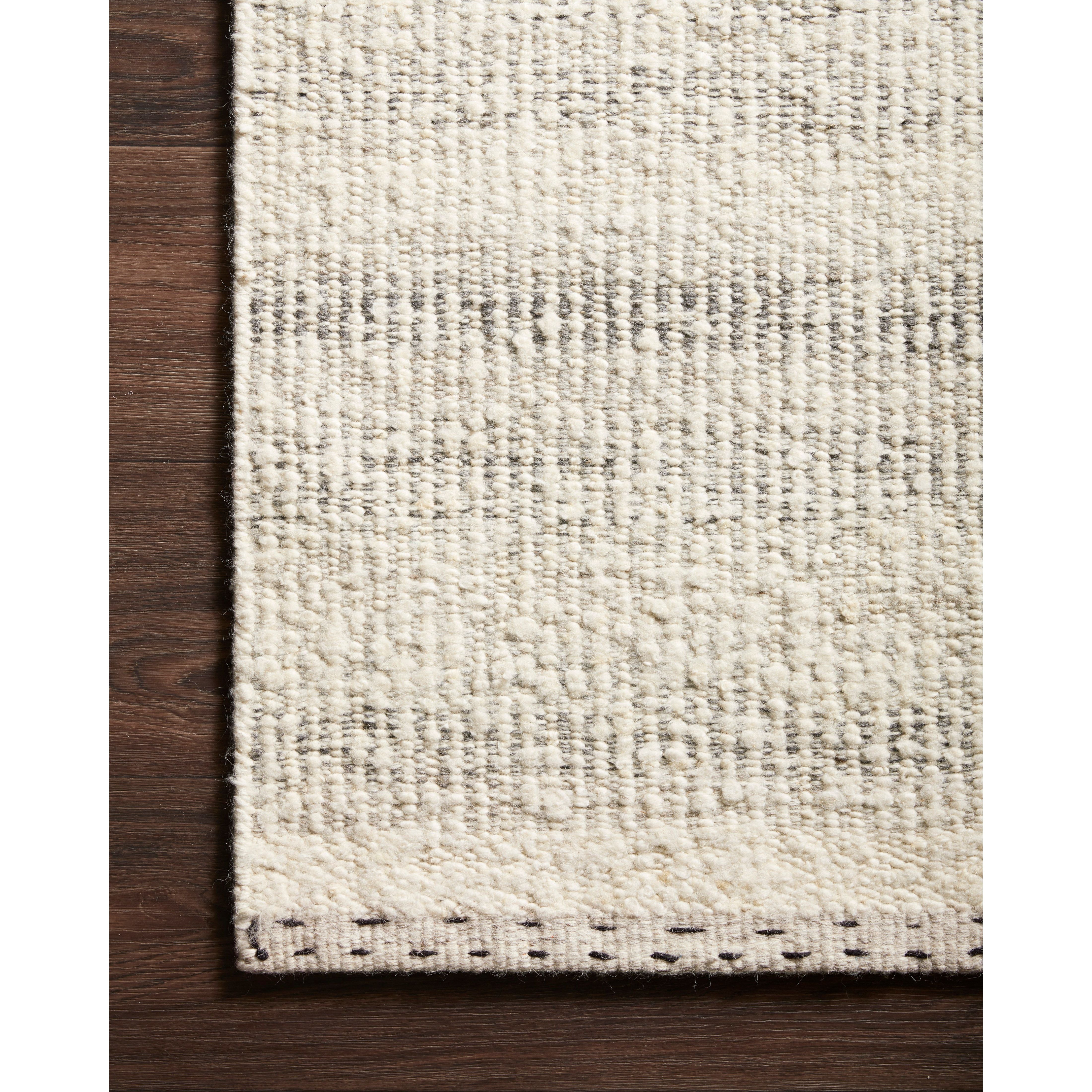 Featuring Sloane Sky Rug by Loloi at Amethyst Home. A perfect blend of refined and relaxed, the Sloane Collection is hand-woven of wool, cotton and polyester by artisans in India. Sloane offers a sophisticated foundation for a contemporarily bohemian look with perfectly woven stripes and minimalist appeal.
Hand Woven73% Wool | 13% Cotton | 11% Polyester | .  Amethyst Home provides interior design, new home construction design consulting, vintage area rugs, and lighting in the Nashville metro area.