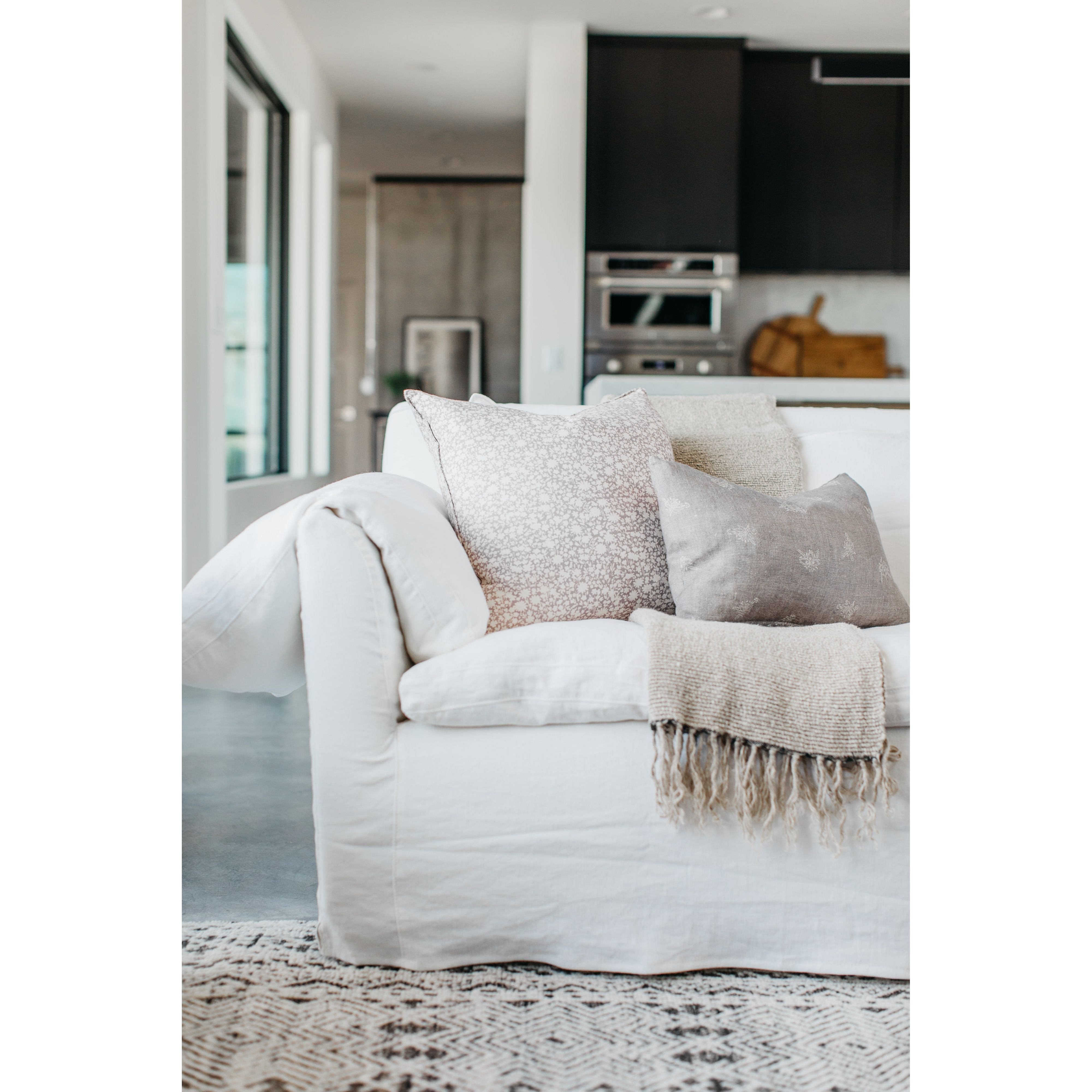 Featuring Donato White Linen Sofa by Cisco Brothers at Amethyst Home. An Amethyst essential: dreamy feather top cushion covers a full upholstered frame. Slipcovered in an ethereal white linen machine washable slipcover — made just for you in North Carolina.
Donato 97" Sofa: 97"w x 32"h x 41"dSeat Space: 85"w x 24"d x 16"h
Pillows: (2) 44x20, (4) 26x26x2. Amethyst Home provides interior design, new home construction design consulting, vintage area rugs, and lighting in the Calabasas metro area.