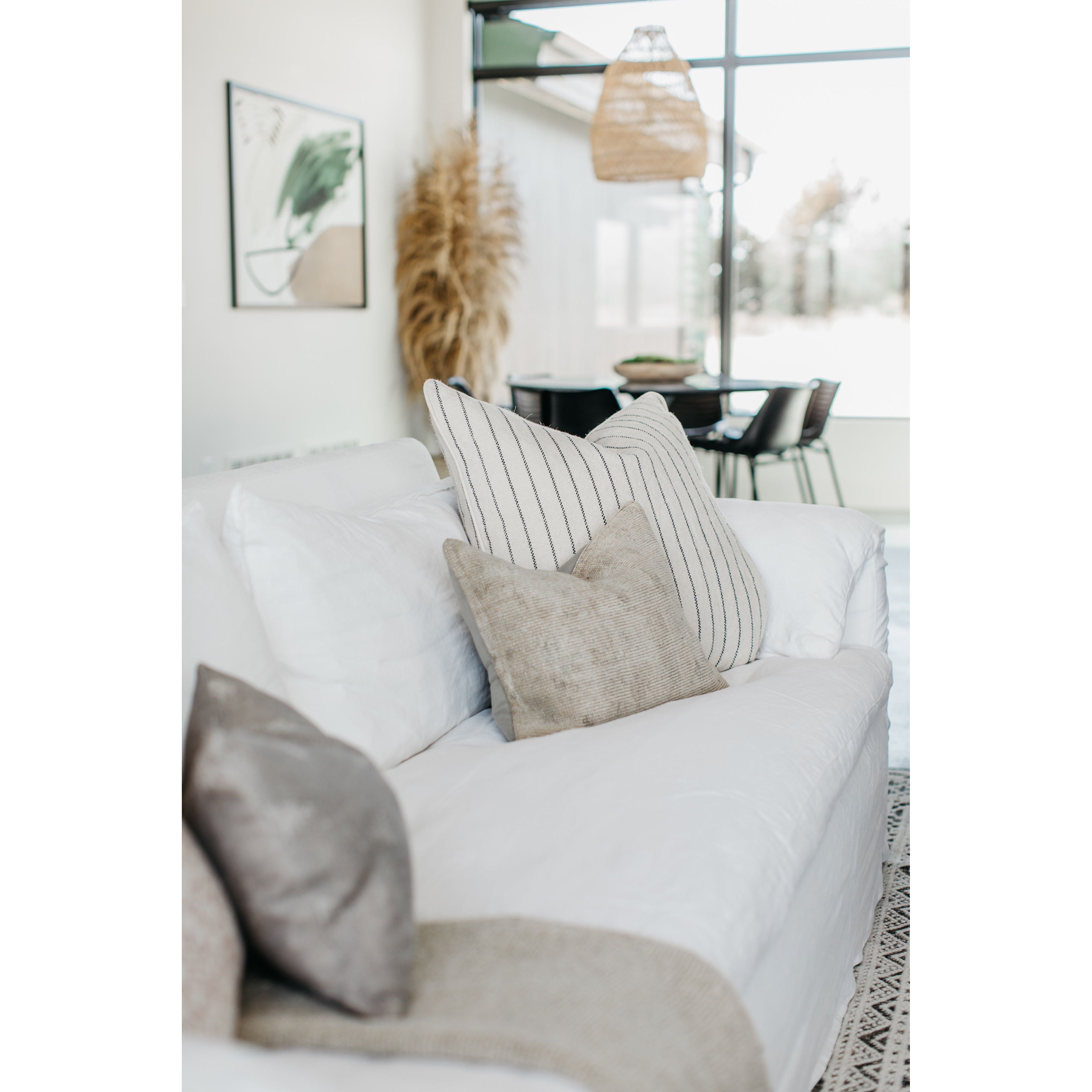 Featuring Donato White Linen Sofa by Cisco Brothers at Amethyst Home. An Amethyst essential: dreamy feather top cushion covers a full upholstered frame. Slipcovered in an ethereal white linen machine washable slipcover — made just for you in North Carolina.
Donato 97" Sofa: 97"w x 32"h x 41"dSeat Space: 85"w x 24"d x 16"h
Pillows: (2) 44x20, (4) 26x26x2. Amethyst Home provides interior design, new home construction design consulting, vintage area rugs, and lighting in the Seattle metro area.