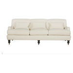 Featuring Beaumont 84" Sofa by Cisco Brothers at Amethyst Home. The Beaumont Sofa by Cisco Brothers is a twist on traditional style, with a piping detail and turned front legs with antique casters. Relax into the comfortable lumber pillows for back support with style. Photographed in Brevard Birch. 
Overall: 84"w x 38"d x 33"hSitting Space: 74"w x 24"dSeat He.  Amethyst Home provides interior design, new home construction design consulting, vintage area rugs, and lighting in the Austin metro area.