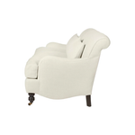 Featuring Beaumont 84" Sofa by Cisco Brothers at Amethyst Home. The Beaumont Sofa by Cisco Brothers is a twist on traditional style, with a piping detail and turned front legs with antique casters. Relax into the comfortable lumber pillows for back support with style. Photographed in Brevard Birch. 
Overall: 84"w x 38"d x 33"hSitting Space: 74"w x 24"dSeat.  Amethyst Home provides interior design, new home construction design consulting, vintage area rugs, and lighting in the Calabasas metro area.