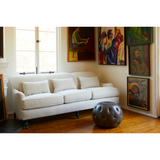 Featuring Beaumont 84" Sofa by Cisco Brothers at Amethyst Home. The Beaumont Sofa by Cisco Brothers is a twist on traditional style, with a piping detail and turned front legs with antique casters. Relax into the comfortable lumber pillows for back support with style. Photographed in Brevard Birch. 
Overall: 84"w x 38"d x 33"hSitting Space: 74"w x 24"dSe.  Amethyst Home provides interior design, new home construction design consulting, vintage area rugs, and lighting in the Kansas City metro area.
