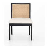 Featuring Antonia Cane Brushed Ebony Armless Dining Chair by Four Hands at Amethyst Home. We love the retro style the natural cane of this Antonia Cane Brushed Ebony Armless Dining Chair brings to a dining room. 
Overall Dimensions: 22.25"W x 23.50"L x 33"HColors: Light Natural Cane, Brushed Ebony, Savile FlaxMaterials: Cane, Solid Nettlewood, 92% Pl, 8% L.  Amethyst Home provides interior design, new home construction design consulting, vintage area rugs, and lighting in the San Diego metro area.