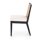 Featuring Antonia Cane Brushed Ebony Armless Dining Chair by Four Hands at Amethyst Home. We love the retro style the natural cane of this Antonia Cane Brushed Ebony Armless Dining Chair brings to a dining room. 
Overall Dimensions: 22.25"W x 23.50"L x 33"HColors: Light Natural Cane, Brushed Ebony, Savile FlaxMaterials: Cane, Solid Nettlewood, 92% Pl, 8% LiF.  Amethyst Home provides interior design, new home construction design consulting, vintage area rugs, and lighting in the Houston metro area.