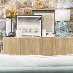 Featuring Mika Dining Sideboard by Four Hands at Amethyst Home. We love the grained matte finish on this Mika Washed Oak Veneer Dining Sideboard. The shelves make this the perfect sideboard for a functional, modernly attractive piece to add to your dining room
Overall Dimensions: 72"W x 16"L x 30"H
Colors: Whitewashed Oak VeneerMaterials: Oak VeneerWeig. Amethyst Home provides interior design, new home construction design consulting, vintage area rugs, and lighting in the Newport Beach metro area.