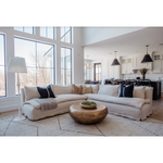 Featuring Laguna 2 Piece Sectional by Cisco Brothers at Amethyst Home. A casual, slipcovered chunky linen sectional by Cisco Brothers, the Laguna 2pc Sectional is the ultimate in casual luxury.  A down-filled seat cushion is supported by springs in a gentle, resting position.  Pair with a one-of-a-kind statement rug for a signature look. Shown in Otis White. Amethyst Home provides interior design, new home construction design consulting, vintage area rugs, and lighting in the Nashville metro area.