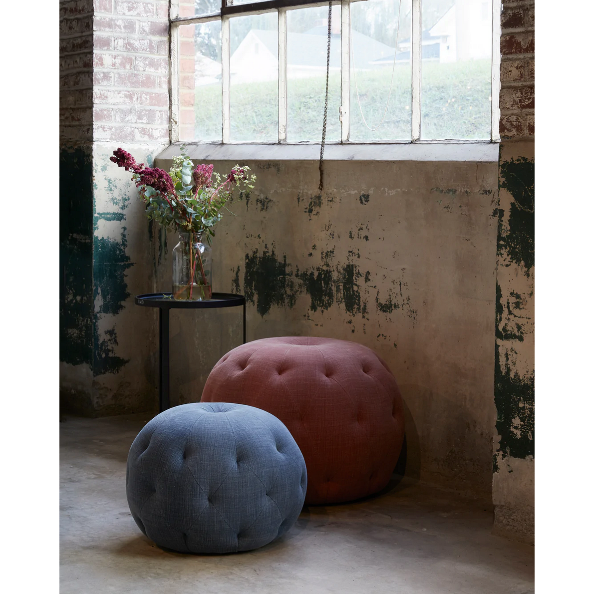 Featuring Pouf 20" Ottoman by Cisco Brothers at Amethyst Home. We love the stitching detail on this Pouf 20" Ottoman by Cisco Brothers. Place in your den, living room, or other entertainment area of your home and keep for years to come! Photographed in Bengal Pin Strip Indigo and Anvil Stone. 
Overall: 20"dia x 15"hSeat Height: 15"h. Amethyst Home provides interior design, new home construction design consulting, vintage area rugs, and lighting in the Scottsdale metro area.