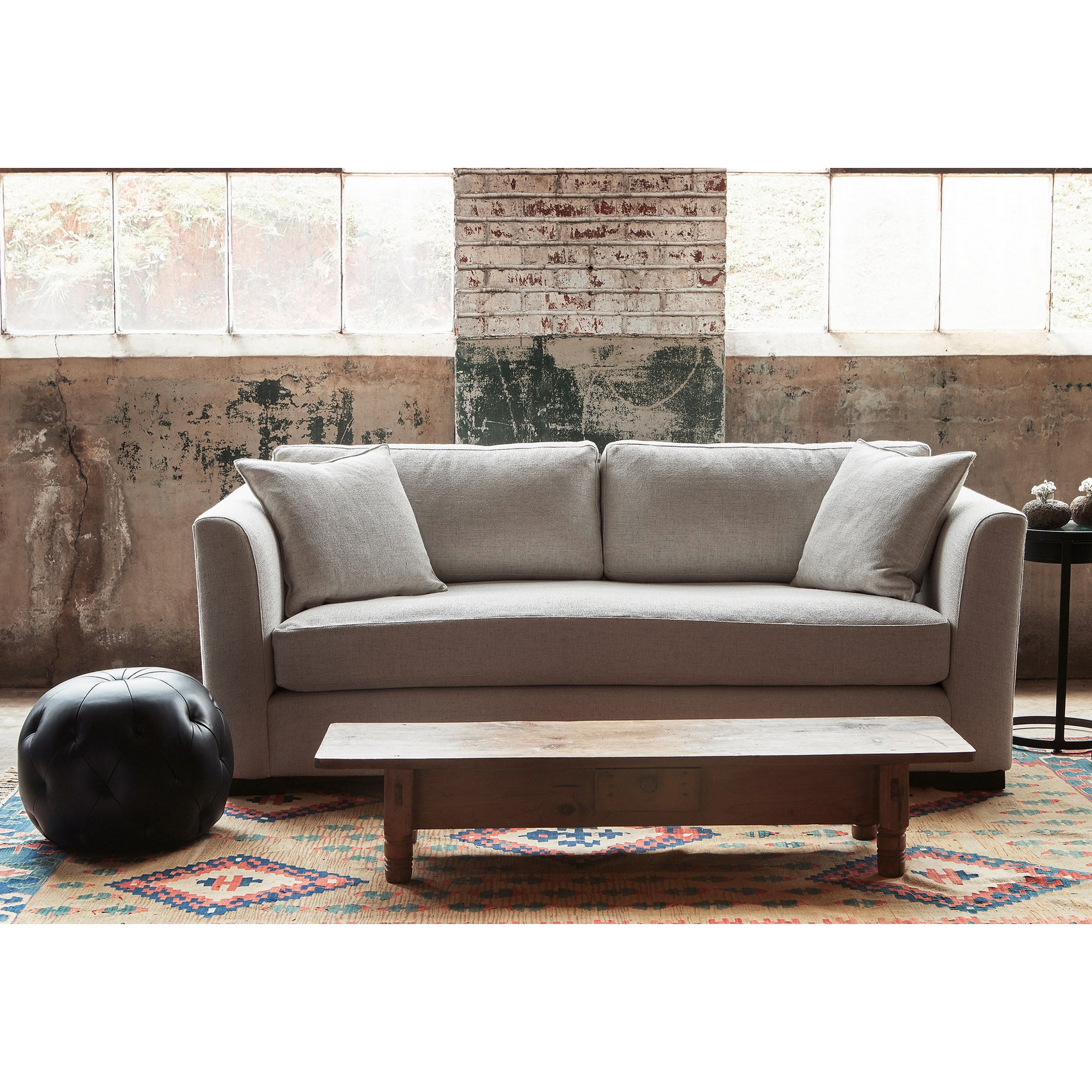 Featuring Pouf 20" Ottoman by Cisco Brothers at Amethyst Home. We love the stitching detail on this Pouf 20" Ottoman by Cisco Brothers. Place in your den, living room, or other entertainment area of your home and keep for years to come! Photographed in Bengal Pin Strip Indigo and Anvil Stone. 
Overall: 20"dia x 15"hSeat Height: 15"h. Amethyst Home provides interior design, new home construction design consulting, vintage area rugs, and lighting in the San Diego metro area.