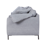 Featuring Radley Upholstered Sofa Family by Cisco Brothers at Amethyst Home. A love letter to the Radley sofa -- the metal iron feet and laid back approach to sitting is effortlessly chic.  A feather cloud cushion with down filled back cushions allow for a sit that is upright yet comfortably deep. Photographed in Molino Fog. Lifestyle Photograph in Grayson.  Amethyst Home provides interior design, new home construction design consulting, vintage area rugs, and lighting in the Park City metro area.