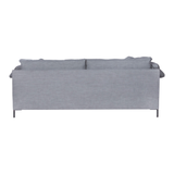 Featuring Radley Upholstered Sofa Family by Cisco Brothers at Amethyst Home. A love letter to the Radley sofa -- the metal iron feet and laid back approach to sitting is effortlessly chic.  A feather cloud cushion with down filled back cushions allow for a sit that is upright yet comfortably deep. Photographed in Molino Fog. Lifestyle Photograph in Grays.  Amethyst Home provides interior design, new home construction design consulting, vintage area rugs, and lighting in the Kansas City metro area.