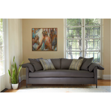Featuring Radley Upholstered Sofa Family by Cisco Brothers at Amethyst Home. A love letter to the Radley sofa -- the metal iron feet and laid back approach to sitting is effortlessly chic.  A feather cloud cushion with down filled back cushions allow for a sit that is upright yet comfortably deep. Photographed in Molino Fog. Lifestyle Photograph in Grayson.  Amethyst Home provides interior design, new home construction design consulting, vintage area rugs, and lighting in the Park City metro area.