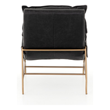 Featuring Taryn Chair - Sonoma Black by Four Hands at Amethyst Home. This Taryn Chair - Sonoma Black is a nod to relaxed modernism, playing up the natural depth of exclusive top-grain leather, with buckle details and low-slung styling crafting the hippest of vibes.
Overall Dimensions: 28"W x 37"L x 35"HColors: Sonoma Black, Aged BrassMaterials: Top Grain Leat.  Amethyst Home provides interior design, new home construction design consulting, vintage area rugs, and lighting in the Austin metro area.