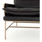 Featuring Taryn Chair - Sonoma Black by Four Hands at Amethyst Home. This Taryn Chair - Sonoma Black is a nod to relaxed modernism, playing up the natural depth of exclusive top-grain leather, with buckle details and low-slung styling crafting the hippest of vibes.
Overall Dimensions: 28"W x 37"L x 35"HColors: Sonoma Black, Aged BrassMaterials: Top Grain Leath.  Amethyst Home provides interior design, new home construction design consulting, vintage area rugs, and lighting in the Omaha metro area.