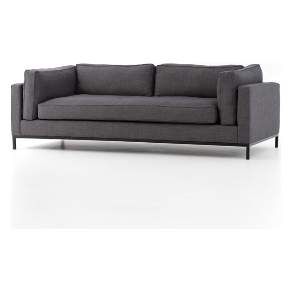 Featuring Grammercy Sofa - Charcoal by Four Hands at Amethyst Home. Streamlined yet comfortable!  We loved the subtle piping of the cushion details and stress-free color!  Flexible style, luxurious comfort and family-friendly upholstery. Clean, simple lines and black iron base keep everything casual and chic. Overall Dimensions: 92"W x 39.50"L x 30"HColors.  Amethyst Home provides interior design, new home construction design consulting, vintage area rugs, and lighting in the Charlotte metro area.