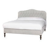 Featuring O'Hara Upholstered Bed by Cisco Brothers at Amethyst Home. Heavy on the elegance with an east-coast vibe! This camelback, button-tufted bed in a light textural grey also features turned legs and upholstered side rails for added interest. 
Queen Dimensions: 67"w x 60"h x 89"dSide Rails: 18"Slat Height: 11.25"Footboard: 18"Mattress Space: 62"w x 81.  Amethyst Home provides interior design, new home construction design consulting, vintage area rugs, and lighting in the Charlotte metro area.