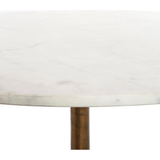 Featuring Helen Round Coffee Table by Four Hands at Amethyst Home. Simple, sophisticated style. The Helen Round Coffee Table has a slim tripod base of raw brass supports a rounded tabletop of polished white marble. Petite scale perfect for smaller spaces or rooms with a sectional.
Overall Dimensions: 32"W x 32"L x 16.50"H
Colors: Raw Brass, Polished White.  Amethyst Home provides interior design, new home construction design consulting, vintage area rugs, and lighting in the San Diego metro area.