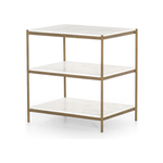 Featuring Felix Nightstand - Antique Brass by Four Hands at Amethyst Home. Add a pop of sophistication to any space. Classic white marble lays three tiers of smooth shelving for plenty of space, while antique brass-finished iron framing places a feminine spin on bedside storage.
Overall Dimensions: 25"W x 18"L x 26"H
Colors: Antique Brass, Polished White Marbl.  Amethyst Home provides interior design, new home construction design consulting, vintage area rugs, and lighting in the Omaha metro area.