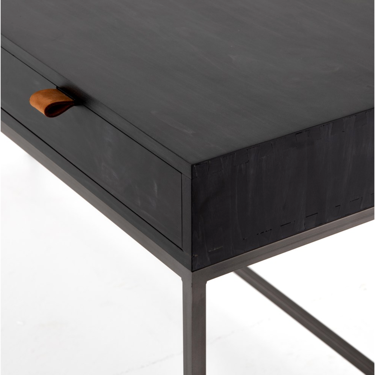 Featuring Trey Modular Writing Desk - Black Wash Poplar by Four Hands at Amethyst Home. The Trey Black Wash Poplar Modular Writing Desk sleek and simple, black-finished poplar offers plenty of desk storage by way of three spacious drawers. Metal-secured pulls of top-grain leather add a textural element of surprise. Great solo or paired with matching corner des.  Amethyst Home provides interior design, new home construction design consulting, vintage area rugs, and lighting in the Omaha metro area.