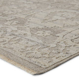 Featuring Sonnette Ayres Hand-Knotted Rug by Jaipur Living at Amethyst Home. The richly textured and elegantly designed Sonnette Ayres Area Rug combines an inviting, soft hand and eye-catching transitional style. The Ayres rug boasts a neutral palette of light taupe and gray that creates beautiful dimension among the brocade design. This hand-knotted wool.  Amethyst Home provides interior design, new home construction design consulting, vintage area rugs, and lighting in the Alpharetta metro area.