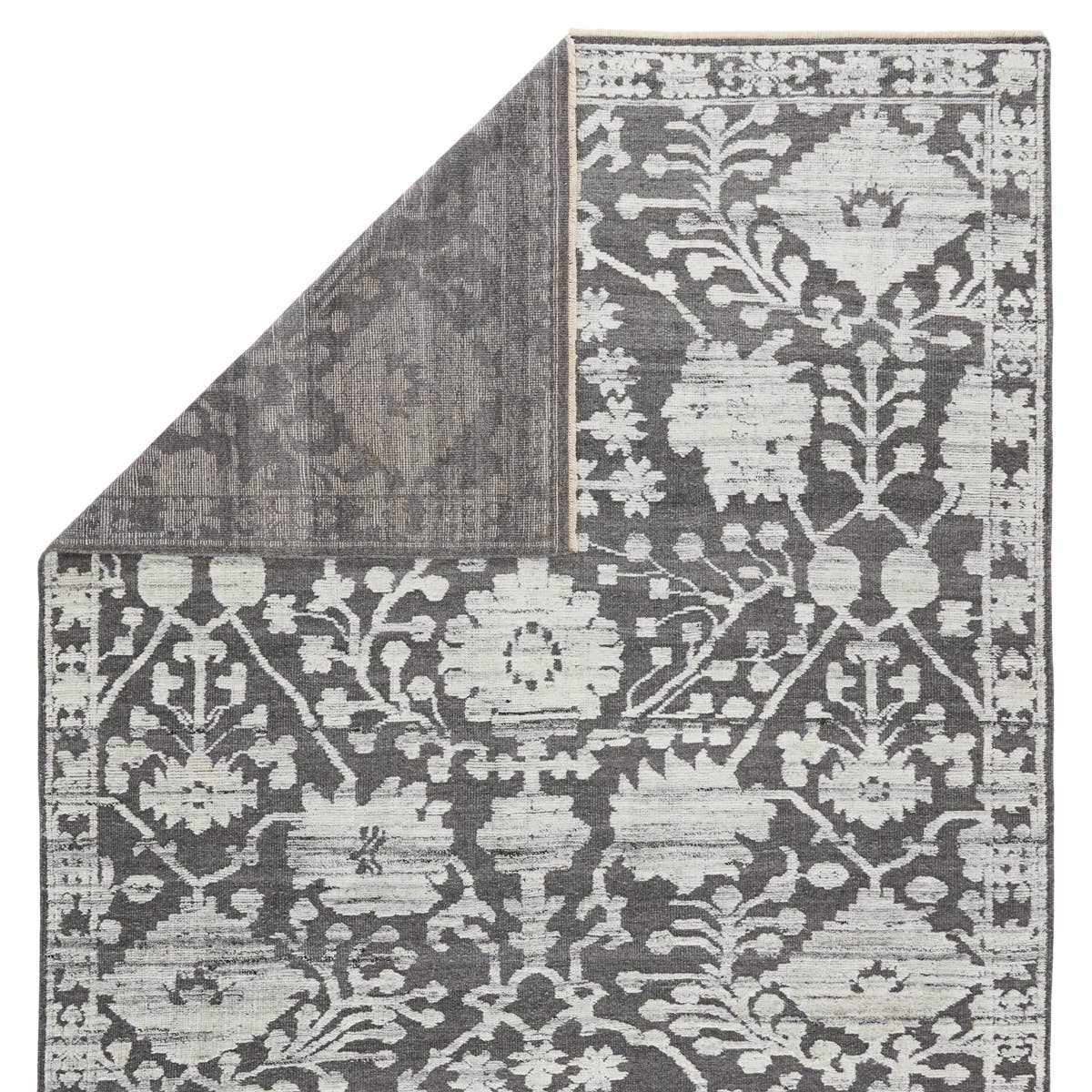 Featuring Sonnette Riona Hand-Knotted Rug by Jaipur Living at Amethyst Home. The richly textured and elegantly designed Sonnette Riona Area Rug combines an inviting, soft hand and eye-catching transitional style. The Riona area rug boasts a high-contrast gray and silver palette that creates beautiful dimension among the florette medallion design. This han.  Amethyst Home provides interior design, new home construction design consulting, vintage area rugs, and lighting in the Alpharetta metro area.
