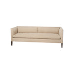 Featuring Stewart Sofa by Cisco Brothers at Amethyst Home. The Stewart Sofa by Cisco Brothers has a simple silhouette with striking angles and trim wooden accent legs. The wide bench cushion provides ample seating space ideal for entertaining. Pop some popcorn and pile on the throw pillows for cozy movie nights with the family. Photographed in Vintage Flax..  Amethyst Home provides interior design, new home construction design consulting, vintage area rugs, and lighting in the Monterey metro area.