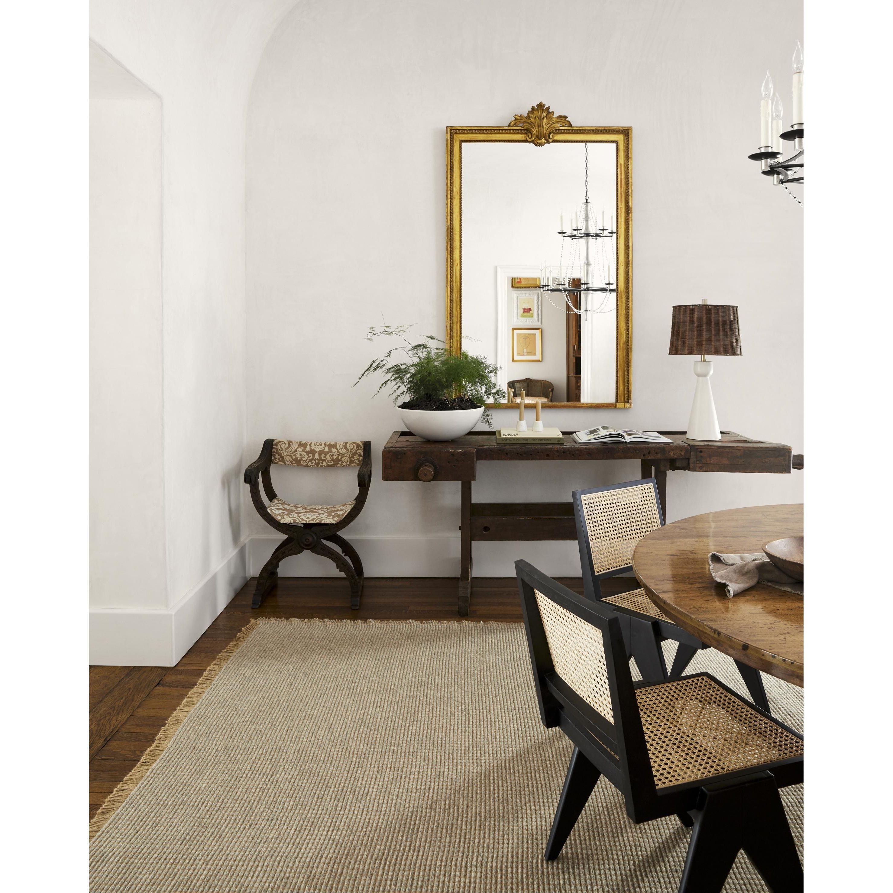 Featuring Becki Owens x Surya Kimi Brown/Gray Rug by Surya at Amethyst Home. This exquisite Kimi area rug from our Becki Owens x Surya line is the perfect combination of style and comfort. Crafted from a unique blend of polypropylene and jute, this rug features a beautiful stitched design that will bring a touch of elegance to any space. The main colors ar. Amethyst Home provides interior design, new home construction design consulting, vintage area rugs, and lighting in the Des Moines metro area.