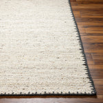Featuring Berkeley Natural / Charcoal Rug by Surya at Amethyst Home. Pleasantly soft to the touch, this organic flecked wool rug is perfect for a minimalist look.  The unique stitching is our favorite part!  Simply vacuum regularly and clean spills with soap and water.
Hand WovenWoolBKY-2300. Amethyst Home provides interior design, new construction, custom furniture, and rugs for Dallas metro area