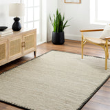 Featuring Berkeley Natural / Charcoal Rug by Surya at Amethyst Home. Pleasantly soft to the touch, this organic flecked wool rug is perfect for a minimalist look.  The unique stitching is our favorite part!  Simply vacuum regularly and clean spills with soap and water.
Hand WovenWoolBKY-2300. Amethyst Home provides interior design, new construction, custom furniture, and rugs for Dallas metro area