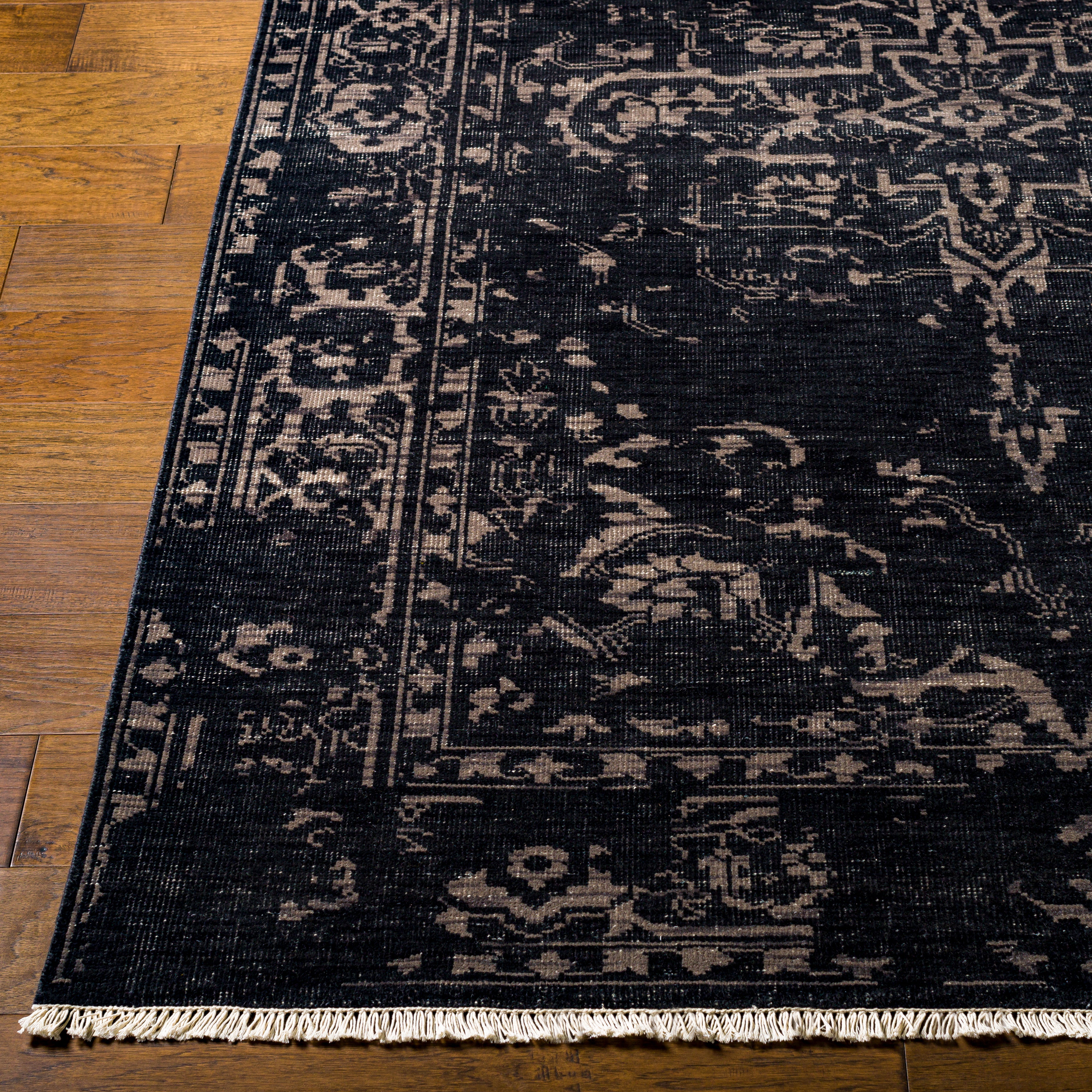 Featuring Festival Dark Charcoal Hand-Knotted Rug by Surya at Amethyst Home. The Festival Collection showcases traditional inspired designs that exemplify timeless styles of elegance, comfort, and sophistication. With their hand knotted construction, these rugs provide a durability that can not be found in other handmade constructions, and boasts the abil.  Amethyst Home provides interior design, new home construction design consulting, vintage area rugs, and lighting in the Alpharetta metro area.