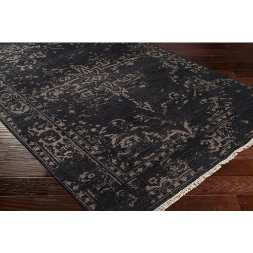 Featuring Festival Dark Charcoal Hand-Knotted Rug by Surya at Amethyst Home. The Festival Collection showcases traditional inspired designs that exemplify timeless styles of elegance, comfort, and sophistication. With their hand knotted construction, these rugs provide a durability that can not be found in other handmade constructions, and boasts the abili.  Amethyst Home provides interior design, new home construction design consulting, vintage area rugs, and lighting in the Charlotte metro area.