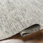 Featuring Hamburg Grey Rug by Surya at Amethyst Home. The simplistic yet compelling rugs from the Hamburg Collection effortlessly serve as the exemplar representation of modern decor. These Hand Loomed pieces are exquisitely crafted and offer natural class and grace to your decor space. Made with Wool in India, and has Low Pile. Spot Clean Only, One Year Limit. Amethyst Home provides interior design, new home construction design consulting, vintage area rugs, and lighting in the Dallas metro area.