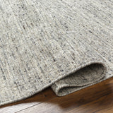 Featuring Hamburg Grey Rug by Surya at Amethyst Home. The simplistic yet compelling rugs from the Hamburg Collection effortlessly serve as the exemplar representation of modern decor. These Hand Loomed pieces are exquisitely crafted and offer natural class and grace to your decor space. Made with Wool in India, and has Low Pile. Spot Clean Only, One Year Limit. Amethyst Home provides interior design, new home construction design consulting, vintage area rugs, and lighting in the Dallas metro area.