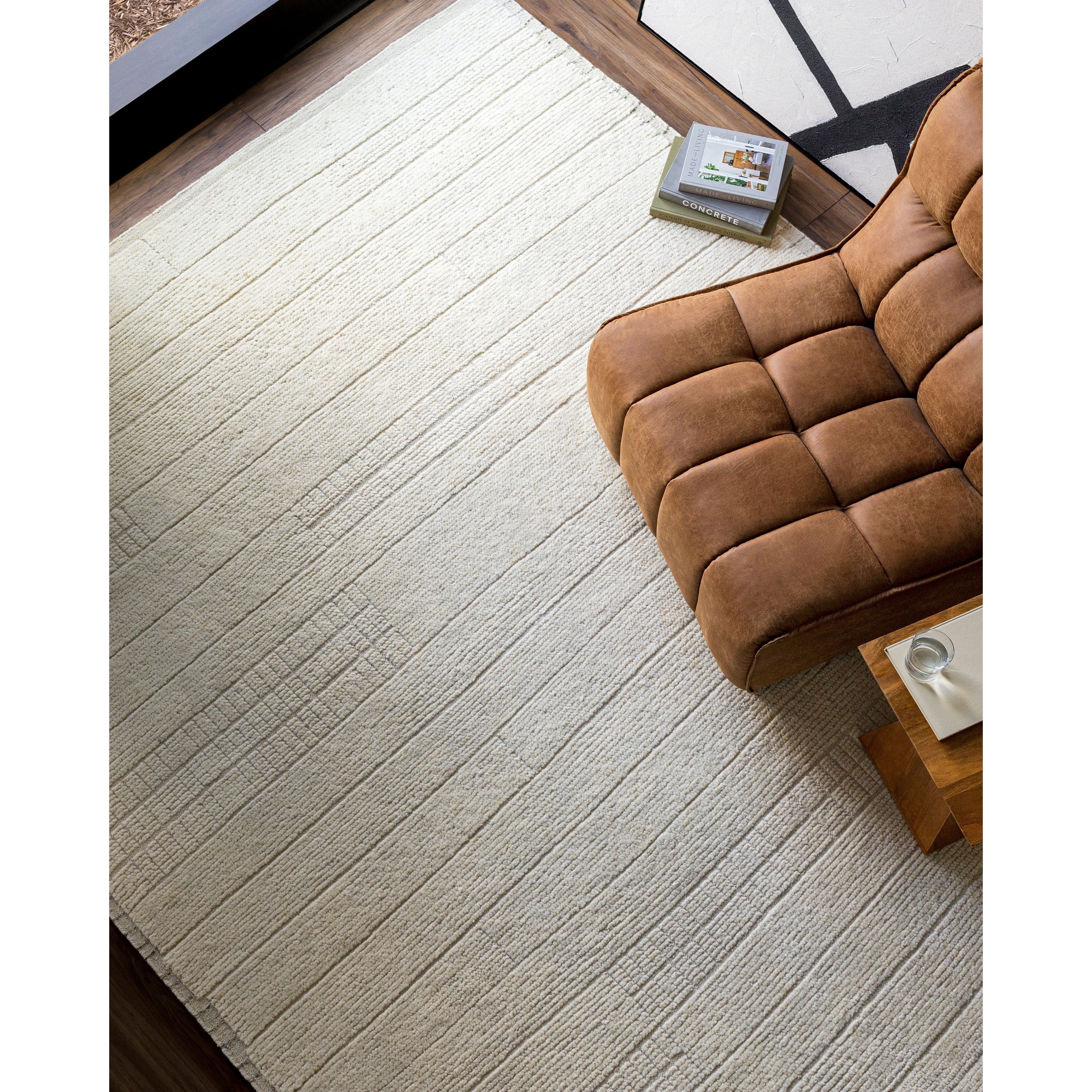 Featuring Khyber Warm Ivory Hand-Knotted Rug by Surya at Amethyst Home. The Khyber Collection features compelling global inspired designs brimming with elegance and grace! The perfect addition for any home, these pieces will add eclectic charm to any room! With their hand knotted construction, these rugs provide a durability that can not be found in other handmade constructions, and boas. Amethyst Home provides interior design, new construction, custom furniture, and rugs for Charlotte metro area.