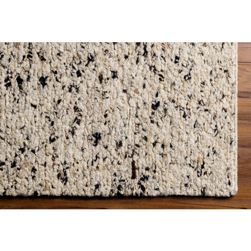 Featuring La Palma Marled Charcoal Hand-Knotted Rug by Surya at Amethyst Home. The simplistic yet compelling rugs from the La Palma Collection effortlessly serve as the exemplar representation of modern decor. With their hand knotted construction, these rugs provide a durability that can not be found in other handmade constructions, and boasts the ability.  Amethyst Home provides interior design, new home construction design consulting, vintage area rugs, and lighting in the Des Moines metro area.