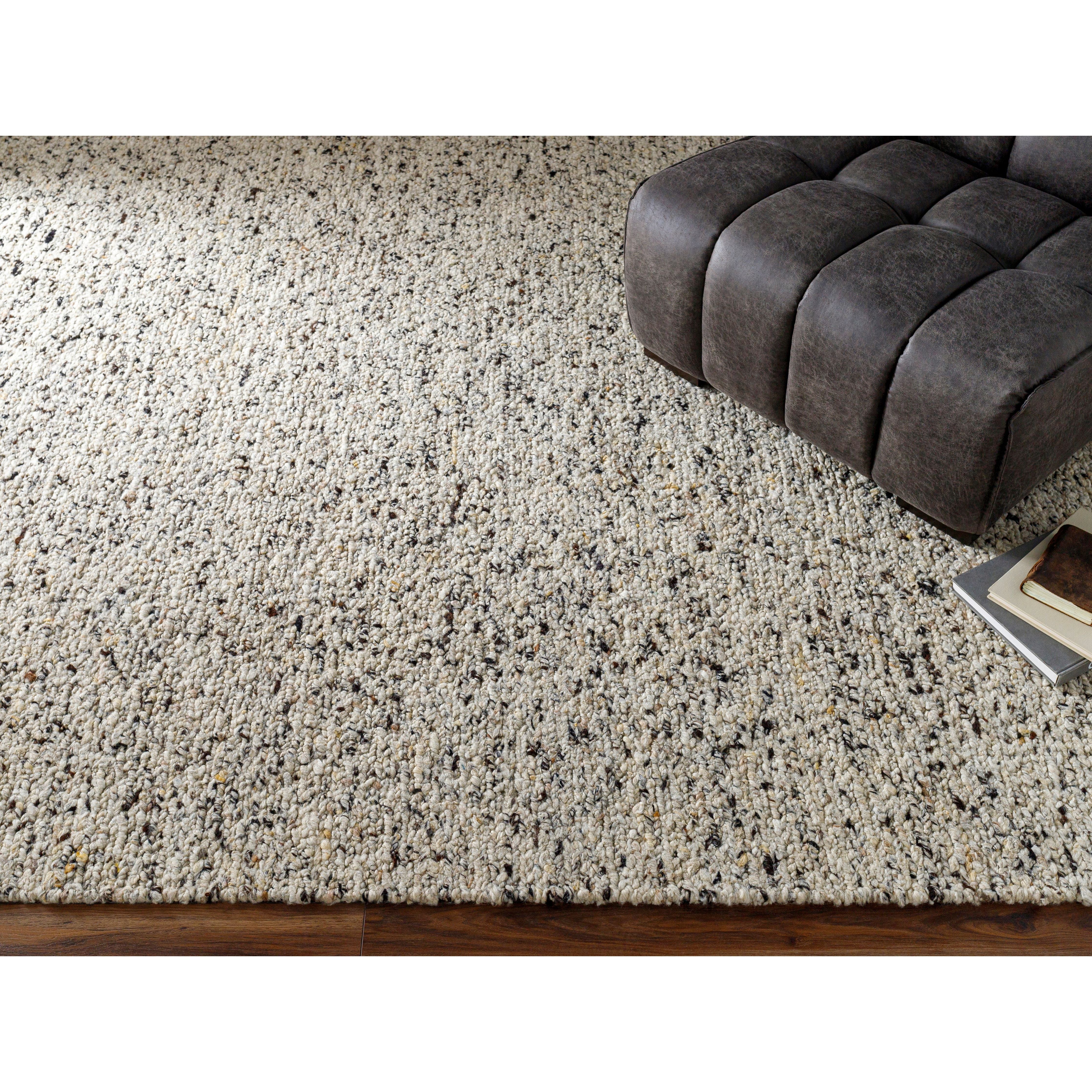 Featuring La Palma Marled Charcoal Hand-Knotted Rug by Surya at Amethyst Home. The simplistic yet compelling rugs from the La Palma Collection effortlessly serve as the exemplar representation of modern decor. With their hand knotted construction, these rugs provide a durability that can not be found in other handmade constructions, and boasts the ability.  Amethyst Home provides interior design, new home construction design consulting, vintage area rugs, and lighting in the Washington metro area.