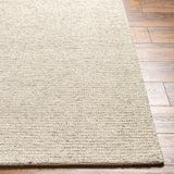 Featuring Mia Rug by Surya at Amethyst Home. The simplistic yet compelling rugs from the Mia Collection effortlessly serve as the exemplar representation of modern decor. The meticulously woven construction of these pieces boasts durability and will provide natural charm into your decor space. Made with Wool in India, and has No Pile. Spot Clean Only, One Year Limited Warranty.
Hand WovenWo. Amethyst Home provides interior design, new construction, custom furniture, and rugs for Houston metro area