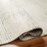Featuring Tunus Taupe Hand-Knotted Rug by Surya at Amethyst Home. The Tunus Taupe Rug features a globally inspired design made from wool. The hand-knotted rug adds wabi sabi charm to any room.
Hand-Knotted100% Wool
Clean spills immediately by blotting with a clean, dry sponge or cloth. Professional cleaning recommended. Appropriate rug pad is highly rec. Amethyst Home provides interior design, new home construction design consulting, vintage area rugs, and lighting in the Winter Garden metro area.