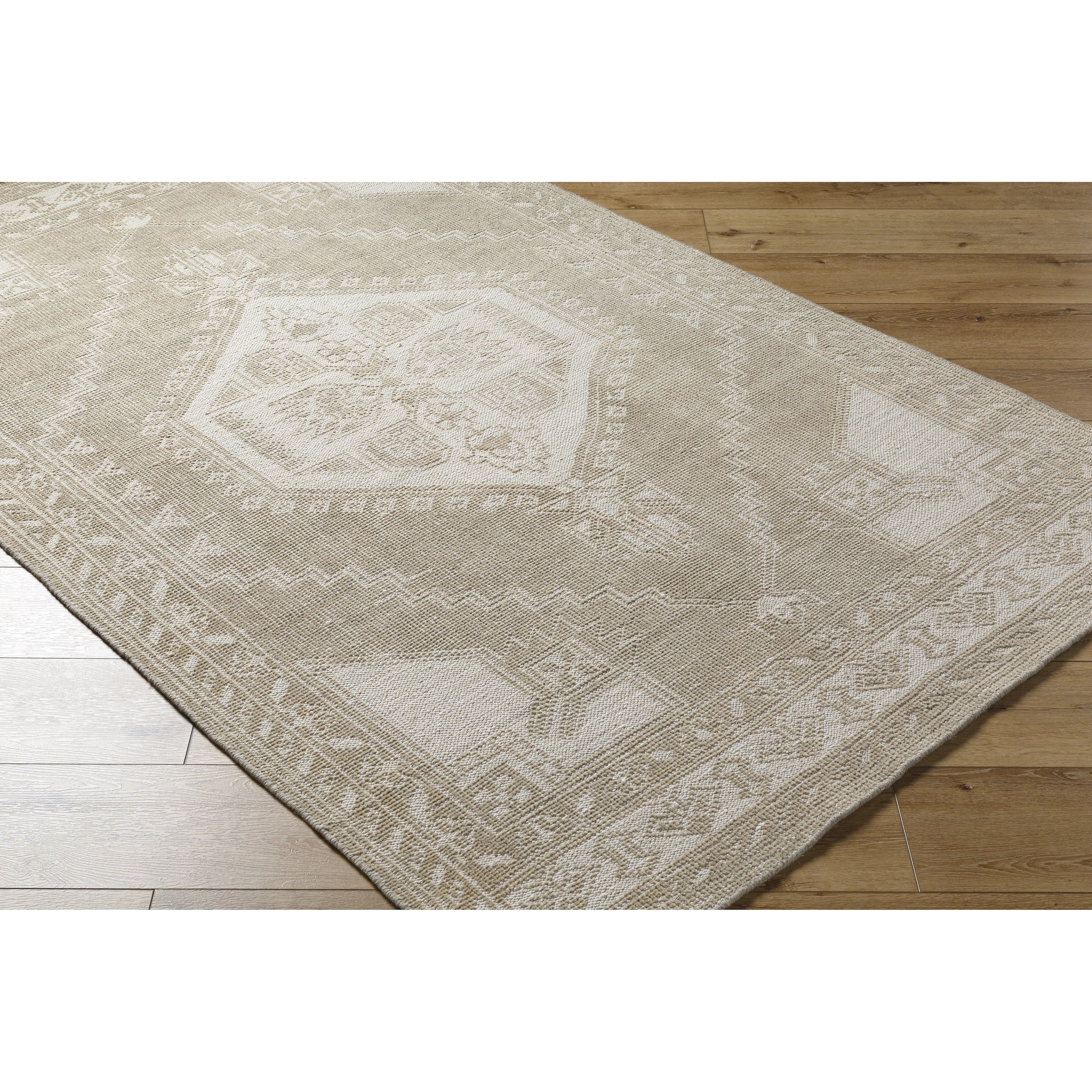 Featuring Zahra Natural Hand-Knotted Rug by Surya at Amethyst Home. The Zahra Collection showcases traditional inspired designs that exemplify timeless styles of elegance, comfort, and sophistication. With their hand knotted construction, these rugs provide a durability that can not be found in other handmade constructions, and boasts the ability to be thorough. Amethyst Home provides interior design, new home construction design consulting, vintage area rugs, and lighting in the Miami metro area.