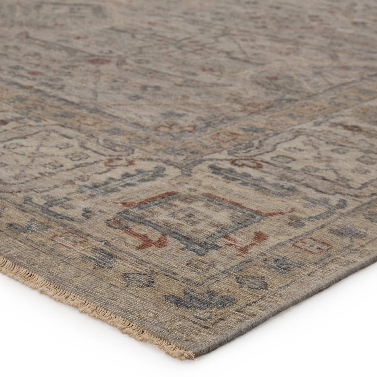 Featuring Tierzah Maison Hand-Knotted Rug by Jaipur Living at Amethyst Home. The vintage-inspired Tierzah Maison Area Rug features an antiqued wash and intricate traditional designs. The Maison wool rug boasts a Persian knot construction and neutral beige, taupe, and gray palette with rich hints of terracotta. This artisan-made rug features fringe trimmed.  Amethyst Home provides interior design, new home construction design consulting, vintage area rugs, and lighting in the Washington metro area.