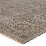 Featuring Tierzah Maison Hand-Knotted Rug by Jaipur Living at Amethyst Home. The vintage-inspired Tierzah Maison Area Rug features an antiqued wash and intricate traditional designs. The Maison wool rug boasts a Persian knot construction and neutral beige, taupe, and gray palette with rich hints of terracotta. This artisan-made rug features fringe trimmed.  Amethyst Home provides interior design, new home construction design consulting, vintage area rugs, and lighting in the Washington metro area.