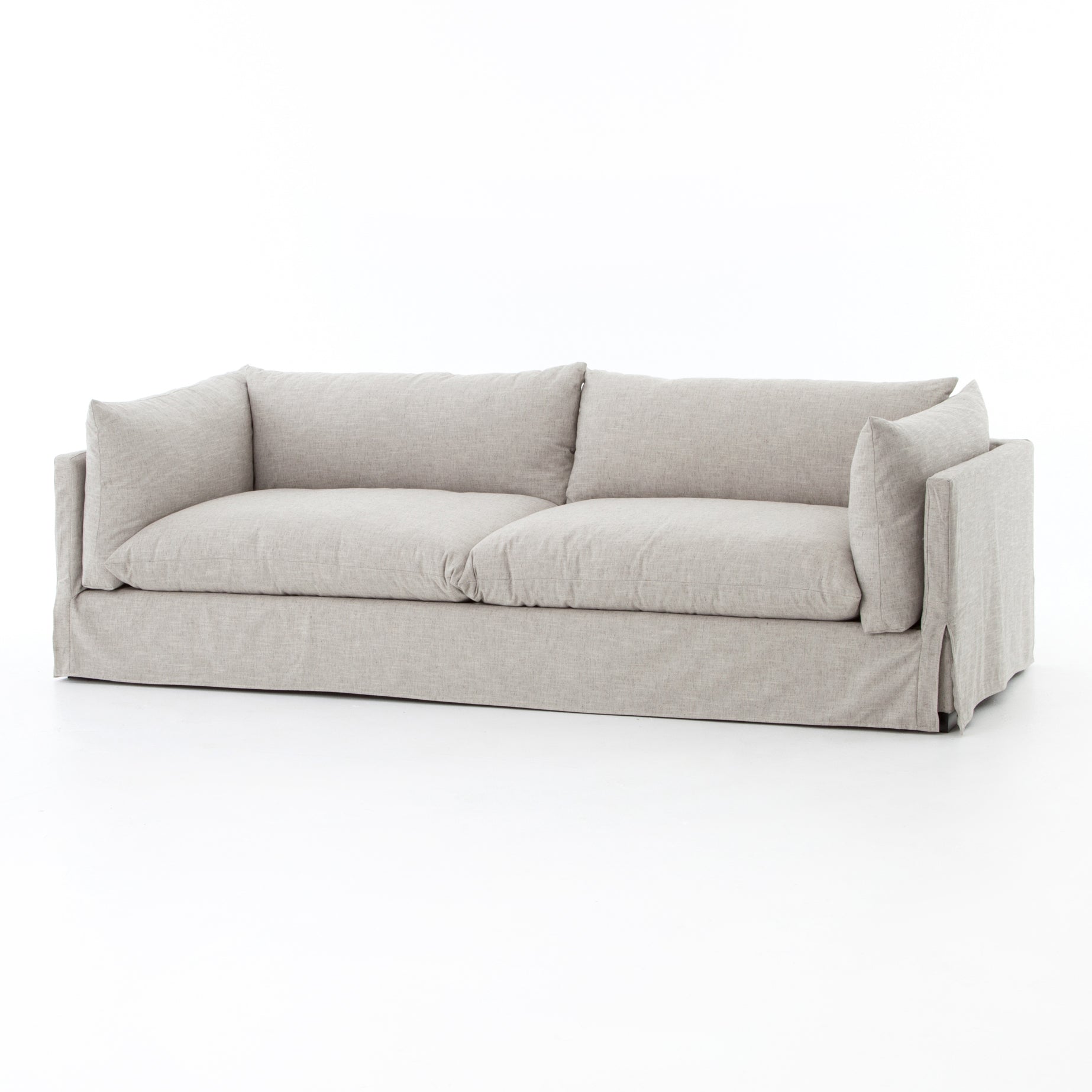 Featuring Habitat Sofa - Valley Nimbus by Four Hands at Amethyst Home. Loungey and slipcovered, the Habitat sofa is made for modern living. Shelter arms and pillow-inspired cushions are covered in comfortable, durable, and stain-resistant performance fabric. The thread within the fabric itself is doused in a material meant to prevent it from becoming staine.  Amethyst Home provides interior design, new home construction design consulting, vintage area rugs, and lighting in the Portland metro area.