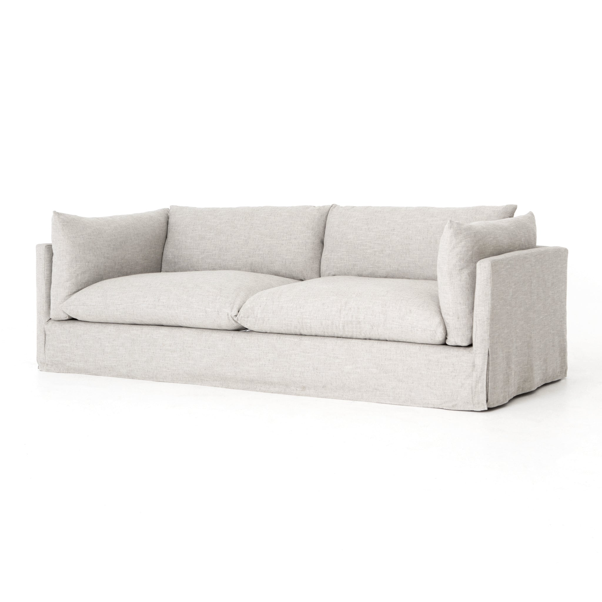 Featuring Habitat Sofa - Valley Nimbus by Four Hands at Amethyst Home. Loungey and slipcovered, the Habitat sofa is made for modern living. Shelter arms and pillow-inspired cushions are covered in comfortable, durable, and stain-resistant performance fabric. The thread within the fabric itself is doused in a material meant to prevent it from becoming stained.  Amethyst Home provides interior design, new home construction design consulting, vintage area rugs, and lighting in the Houston metro area.
