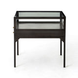 Featuring Shadow Box End Table by Four Hands at Amethyst Home. A shadowbox-inspired end table gives your inner collector a place to play. Frame prized possessions in a glass enclosure with matte-black metal and brass knobs. The perfect end table for a bed or sofa!
Overall Dimensions: 24"W x 24"L x 24"H
Colors: Black, Tempered GlassMaterials: Iron, Temp.  Amethyst Home provides interior design, new home construction design consulting, vintage area rugs, and lighting in the Newport Beach metro area.