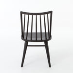 Featuring Windsor Black Oak Dining Chair by Four Hands at Amethyst Home. Try a cleaner, more modern take on the traditional Windsor with our Windsor Dining Chair. This tall beauty is wire-brushed to bring out the cathedral grain in the oak, and stained deep black for lovely contrast with more industrial decor. This chair is super comfortable and perfect .  Amethyst Home provides interior design, new home construction design consulting, vintage area rugs, and lighting in the Kansas City metro area.