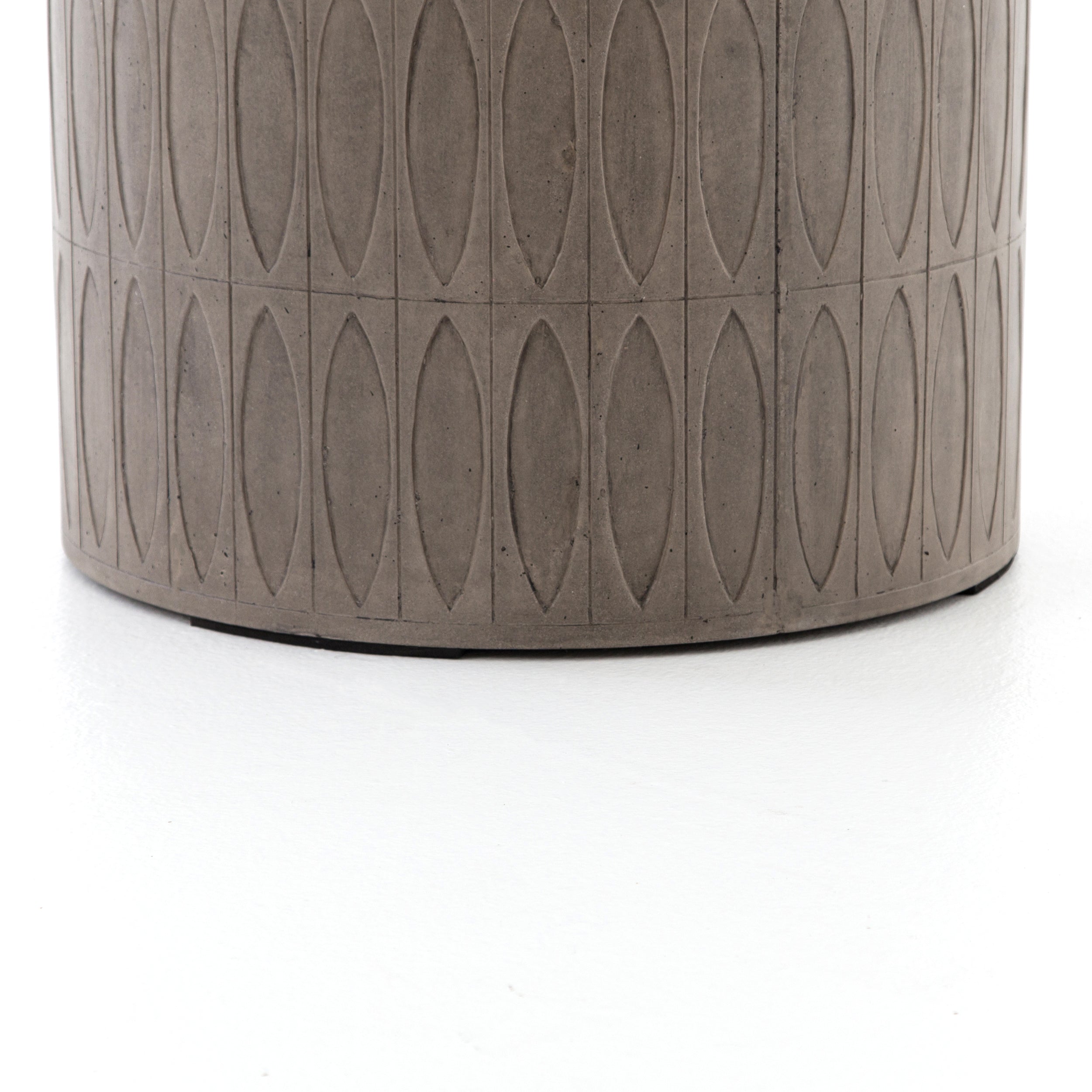 Featuring Colorado End Table by Four Hands at Amethyst Home. Concrete adopts alluring shapes as modern geometry plays with nature's petal form. Dark grey concrete is intricately etched for artistic intrigue. Safe indoors or out. Cover or store indoors during inclement weather or when not in use.
Overall Size: 20"W x 20"L x 20"HColors: Grey ConcreteMaterials: C.  Amethyst Home provides interior design, new home construction design consulting, vintage area rugs, and lighting in the Omaha metro area.