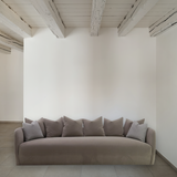 The Milo Sofa Family is a modern masterpiece from Verellen. With thin arms and clean lines, this will be a family favorite for movie nit. It comes standard with:  Spring down Tight seat and back Multi-back pillow configuration Notch bottom toss pillows Double needle stitch detail Upholstered On glides